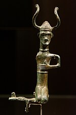 Horned helmet bronze figurine (c. 8th century BC), Denmark.