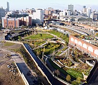 Mayfield Park with Manchester's skyscrapers and high rise from above