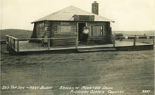 Photograph of Adrian Tousigant standing in the doorway of the