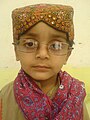 Sindhi ajrak and Sindhi topi.