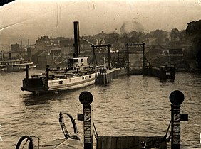 Vehicular ferry, Koondooloo, at Jeffrey Street Wharf, Kirribilli circa 1925. All vehicular ferries ceased service with weeks of the 1932 Sydney Harbour Bridge opening.