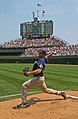 Image 11 Chris Young Photo credit: Antonio Vernon Baseball pitcher Chris Young of the San Diego Padres practices his four-seam fastball before the June 16, 2007 game against the Chicago Cubs at Wrigley Field. During the game, Young hit Derrek Lee with a pitch, which led to a bench-clearing brawl. Both players were ejected from the game, which ended in a 1–0 victory for San Diego. The game took place a few weeks before Young was added to his first Major League Baseball All-Star Game roster via the All-Star Final Vote. The picture also depicts a Wrigley Field bullpen located in playable foul territory. In the background, the old-fashioned scoreboard and the 2005–06 reconstruction of the centerfield bleachers are visible. March 25 is Opening Day for Major League Baseball. More selected pictures