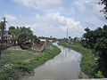 Jamuriya Nala (a brook) from Railway Station Road Bridge. This brook flows through the city and divides it into two halves.