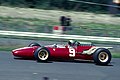 With the exception of the 1964 United States and Mexican Grands Prix, Ferrari has always raced in the Italian national racing colour of rosso corsa. This is Lorenzo Bandini driving the Ferrari 312 at the 1966 German Grand Prix.