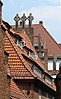 figures of seven "lazy" brothers on Bremen roof