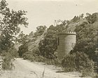 Old black and white photo of brick tower