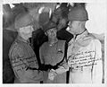 Major General John W. Leonard (9th Armored Div.), Colonel Albert Kelly and Brigadier General John L. Pierce (16th Armored Div.) on the wartime photo.