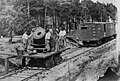 Soldiers with cannon on small railroad car during the American Civil War.