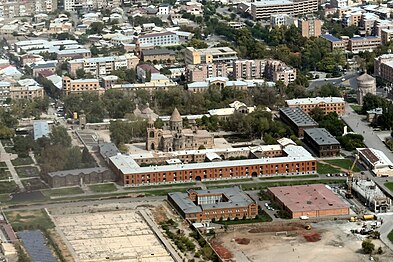 An aerial view of the cathedral and the Mother See complex surrounding it from a plane