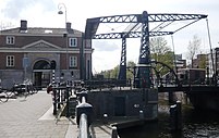 cast iron bascule bridge built in 1906 across the Nieuwe Herengracht in Amsterdam.