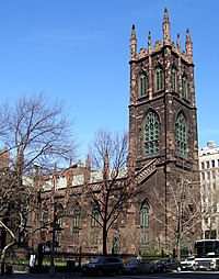 Exterior of Gothic Revival style church with a large tower.