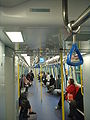 Interior of a passenger car of Ma On Shan line SP1950 train, built by Kinki Sharyo