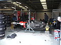 The CR Flamengo car in the pitlane garage at Silverstone Circuit (2010)