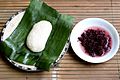 Tapai ketan (right) served with uli (glutinous rice cooked with grated coconut, and mashed; left)