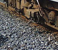 A contact shoe for top-contact third rail on SEPTA's Norristown High Speed Line (third rail not visible)