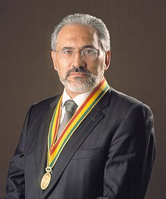 Carlos Mesa poses for a studio portrait