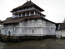 The Lankatilaka Vihara, a 14th-century building influenced by Dravidian architecture, designed and involving an architect and craftsmen from South India.