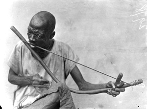 Obu man playing a musical bow, Obubra, Cross River State, Nigeria