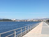 Pontevedra seafront promenade with the city