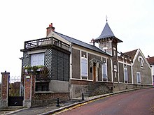 exterior shot of small 19th-century French country house