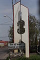 The monument at the entrance to Reghin, welcoming people