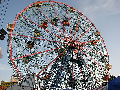 Wonder Wheel, a 45.7-metre (150 ft) tall eccentric wheel at Deno's Wonder Wheel Amusement Park, Coney Island, was built in 1920 by the Eccentric Ferris Wheel Company[177]