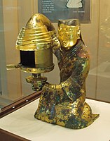 Gilt Bronze Human-Shaped Lamp, made in the Western Han Dynasty, dated 172 BC. It is a Grade I antique in China, and is now stored in the Hebei Museum.