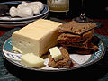 Image 6 Limburger cheese Photo credit: Jon Sullivan/Pharaoh Hound A plate of Limburger cheese and pumpernickel bread. Limburger originated from Limburg, Belgium, and is known for its strong odor, which is due in part to being fermented with the same bacteria partially responsible for human body odor. More selected pictures
