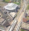 Aerial view of Amsterdam Arena in 2005 showing the adjacent tracks and halt