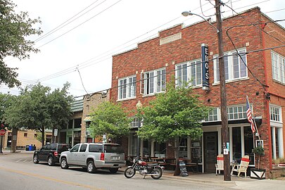 Historic brick building with stepped parapet (2012)