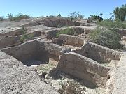 A large plaza in front of the Mesa Grande Temple Mound which was enclosed by a large adobe wall. The plaza is located in the Mesa Grande Cultural Park at 1000 N. Date St. The Mesa Grande Cultural Park was listed in the National Register of Historic Places in November 21, 1978, reference number 78000549.