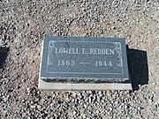 The grave site of Lowell Edward Redden (1865-1944). Redden was a pioneer and farmer in Tempe. His house is listed in the National Register of Historic Places. He is buried in sec. C-1.