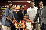 Shri.Chittani Hegde receiving Aryabhata International award by Aryabhata cultural Organization for immense contribution in field of Yakshagana
