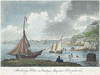Sea bathing in mid Wales c. 1800. Several bathing machines can be seen.