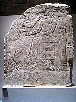 Relief depicting the king with Egyptian gods present