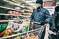 Shoppers in London panic buying canned food and toilet paper during the COVID-19 pandemic