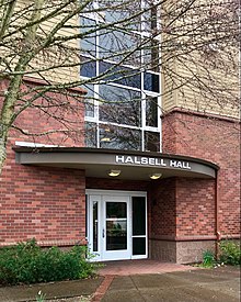 Front entrance of Carrie Halsell Residence Hall at Oregon State University. Above the doorway it reads, "Halsell Hall".