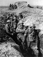 Image 13 Poison gas in World War I Photo credit: Frank Hurley A group of Australian infantry wearing Small Box Respirators (SBRs) at the Third Battle of Ypres in September 1917. After the introduction of poison gas in World War I, countermeasures were developed. SBRs represented the pinnacle of gas mask development during the war, a mouthpiece connected via a hose to a box filter (hanging around the wearer's neck in this picture), which in turn contained granules of chemicals that neutralised the gas. The SBR was the prized possession of the ordinary infantryman; when the British were forced to retreat during the German Spring Offensive of 1918, it was found that while some troops had discarded their rifles, hardly any had left behind their respirators. More selected pictures