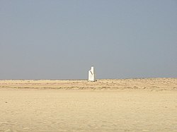 The lighthouse and the headland facing about southwest and the point