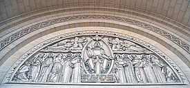Tympanum on interior of entrance to Basilica at Lisieux. Shows Jesus with the Apostles and the Virgin of Mount Carmel.