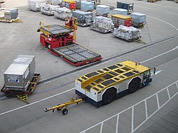 A pushback tug with towbar attached