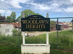 "Welcome to Woodlawn Heights" sign.