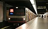 A train on Amsterdam Metro line 53 makes a station stop at Amsterdam Centraal in 2009