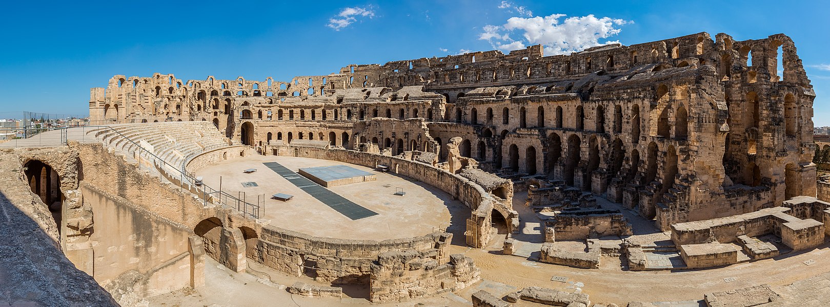 Tunisia: Panoramic view of the Amphitheatre of El Jem, an archeological site in the city of El Djem. The amphitheatre, a UNESCO World Heritage Site since 1979, was built around 238 AD, when the modern Tunisia belonged to the Roman province of Africa. It is the third-biggest amphiteatre and one of the best-preserved Roman ruins in the world, with a capacity for 35,000 spectators.