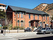 The Phelps Dodge Headquarters Building was built in 1896 and is located in 5 Copper Queen Plaza. The building was the headquarters of the Phelps Dodge Mining Co. from 1896 to 1961. It now houses the Bisbee Mining & Historical Museum. It was the first museum in the southwest to be distinguished as a Smithsonian Affiliate Museum. The building was listed in the National Register of Historic Places on June 3, 1971, reference #71000109.