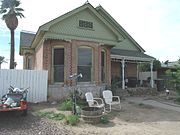 The C. P. Cronin House was built in 1893 and is located at 2029 W. Jefferson St. Designated as a landmark with Historic Preservation-Landmark (HP-L) overlay zoning (PHPR).