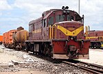 An SAR class 33 (a GE U20C) switching freight cars at Saldanha, Western Cape, in 2009