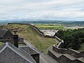 Has a more clearly defined fore- and background, imo more natural colours and, most importantly, shows a lot more of the interestingly shaped outer wall.