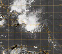 A disorganized mass of thunderstorms over Puerto Rico and the Dominican Republic. The image depicts most of the eastern Caribbean and the surrounding landmasses.