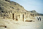 Exterior view of ancient tombs in a desert setting